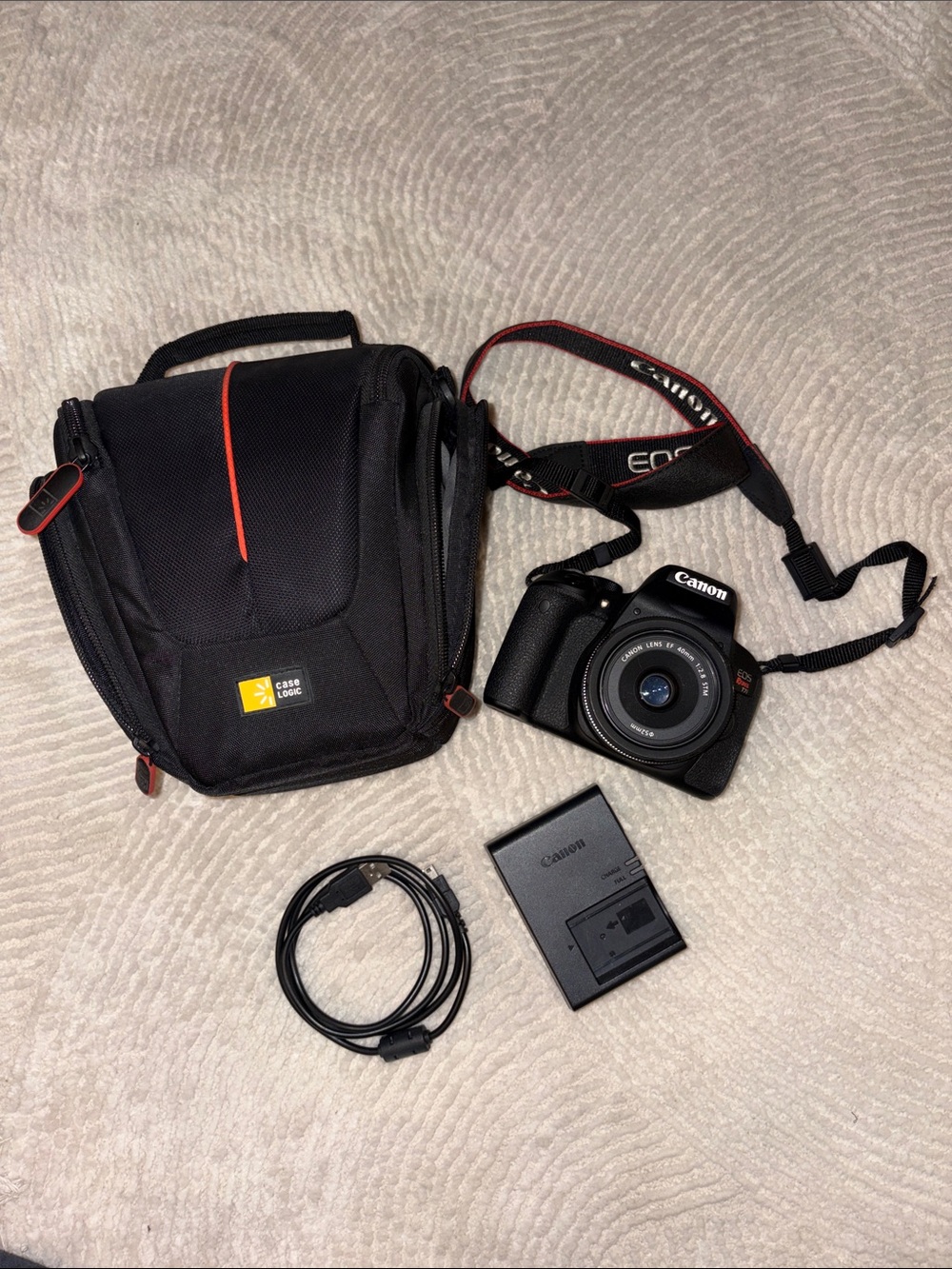 Canon EOS Rebel T7i DSLR Camera in Black with Red-Trim Strap - Picture 4 of 5